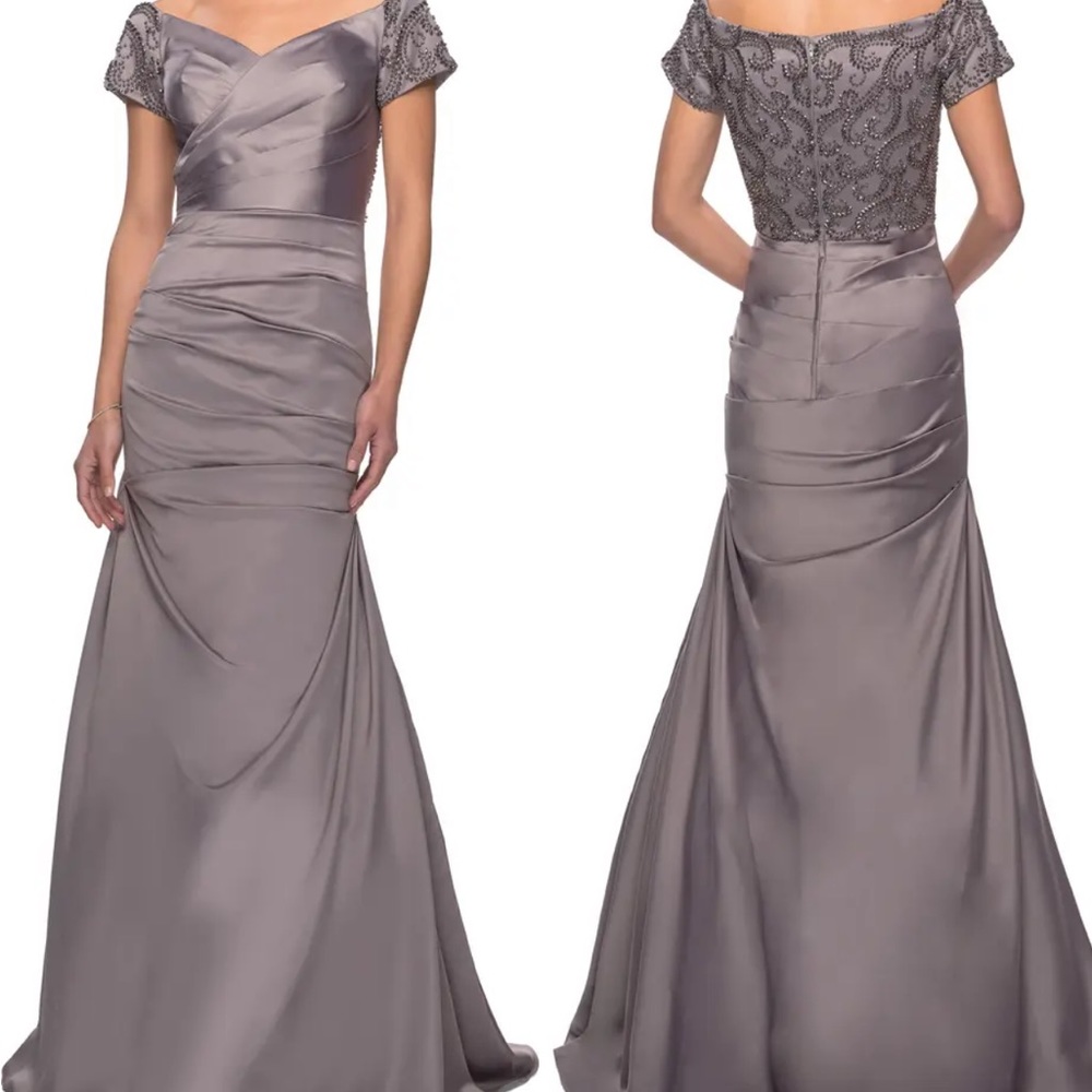 Brand new, has tags. Great for mother of bride or groom.